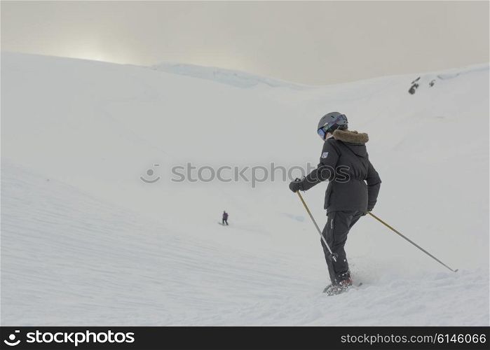 Girl skiing on snow covered mountain, Whistler, British Columbia, Canada