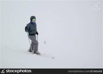 Girl skiing on snow covered mountain, Whistler, British Columbia, Canada