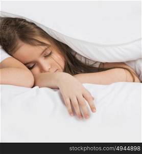 Girl sleeping in bed. Beautiful girl sleeping in bed under white blanket
