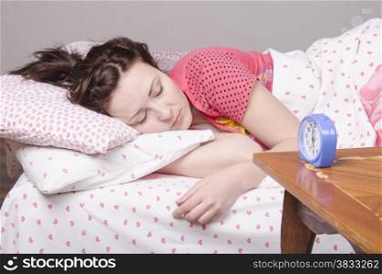 Girl sleeping in bed. It wakes service