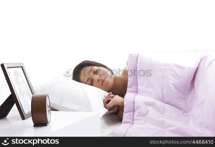 Girl sleeping on bed