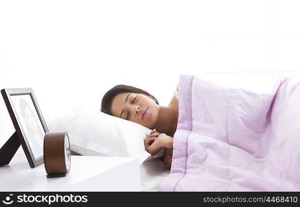 Girl sleeping on bed