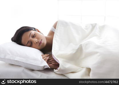 Girl sleeping on bed
