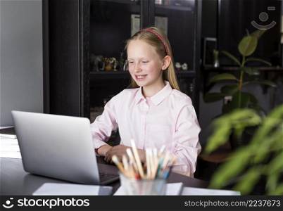 girl smiling her colleagues from home