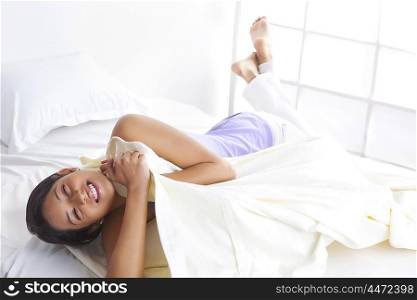 Girl smiling in bed