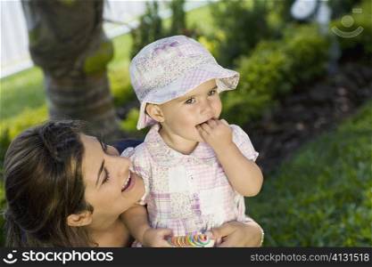 Girl smiling with her mother