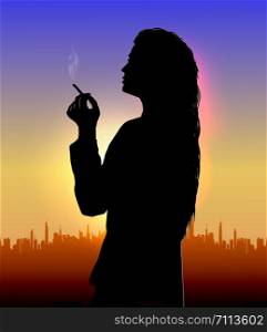 girl smokes at sunset