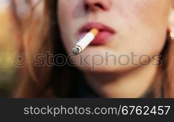 girl smoking close-up