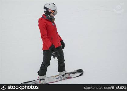 Girl snowboarding, Whistler, British Columbia, Canada