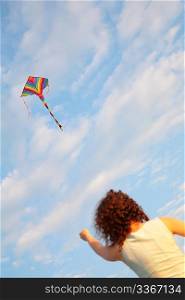 Girl starting kite