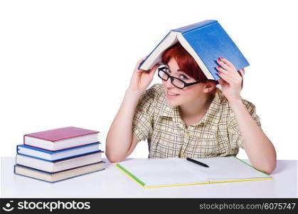 Girl student with books on white