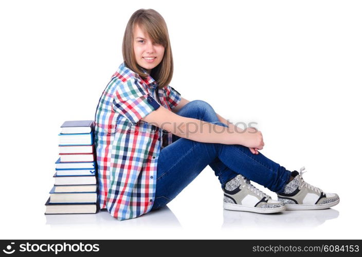 Girl student with books on white