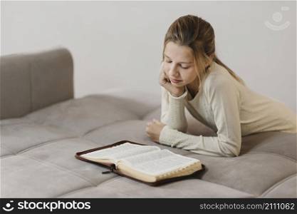 girl studying holy book