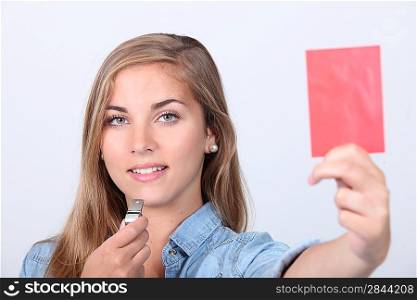 Girl taking red cardboard