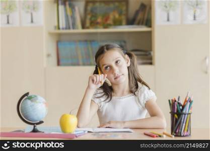 girl thinking during lesson