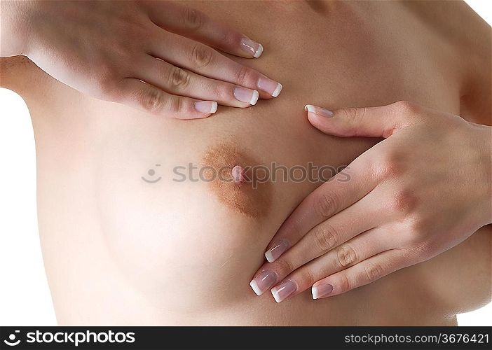 girl touching her breast to check it for her health care