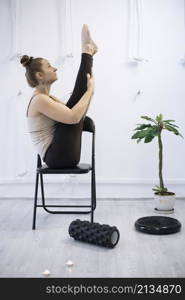 girl training in yoga studio. Healthy and fly Yoga Concept. happy smiling girl