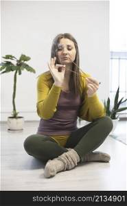 girl training in yoga studio. Healthy and Yoga Concept. yogi girl with aromatic indian sticks