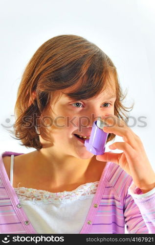 girl using inhaler