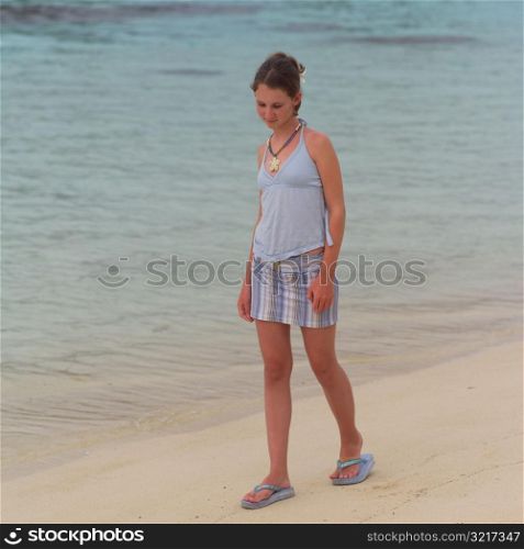 Girl Walking on Beach at Moorea in Tahiti