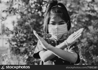 Girl wearing a surgical mask to fight and prevent the coronara virus disease 2019.