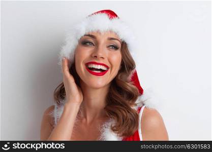 Girl wearing santa claus clothes. Portrait of beautiful sexy girl wearing santa claus clothes
