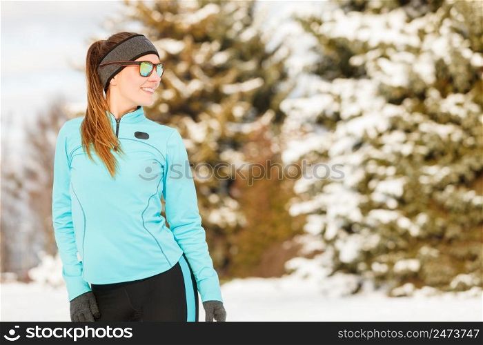 Girl wearing sportswear. Winter sports, outdoor fitness, fashion, workout, health concept.. Winter workout. Girl wearing sportswear and sunglasses.