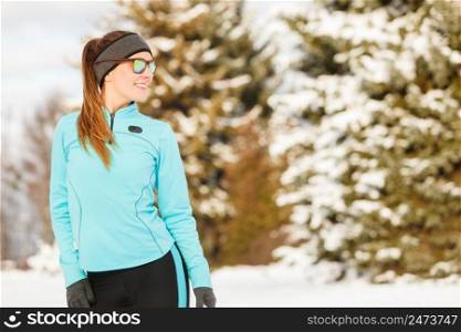 Girl wearing sportswear. Winter sports, outdoor fitness, fashion, workout, health concept.. Winter workout. Girl wearing sportswear and sunglasses.