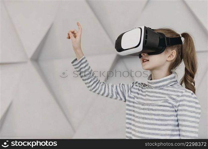 girl wearing virtual reality headset holding hand air