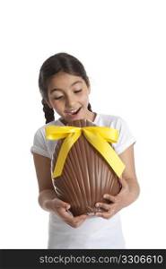 Girl with a large chocolate easter egg