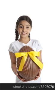 Girl with a large chocolate easter egg