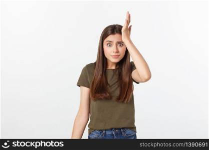 Girl with a suspicious look and hand on her side on a white isolated background. Girl with a suspicious look and hand on her side on a white isolated background.