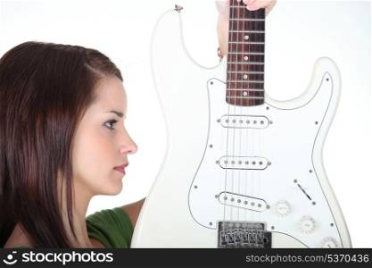 Girl with an electric guitar