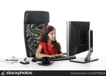 girl with astonishment looks in the computer monitor. Isolated on white background