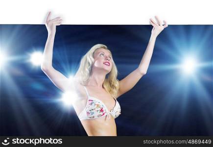 Girl with banner. Attractive girl in swimming suit with white blank banner. Place for text
