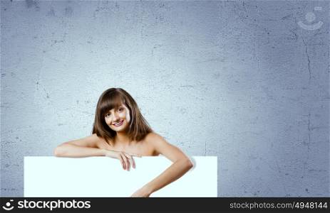 Girl with banner. Naked attractive girl with white blank banner