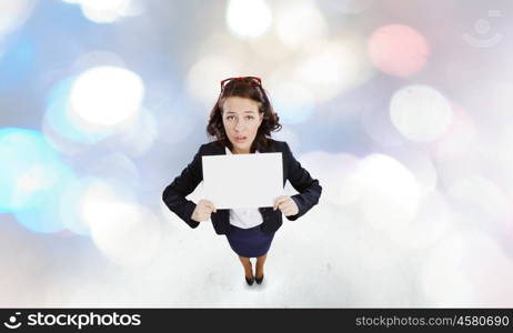 Girl with banner. Top view of excited businesswoman holding white blank banner. Place for text