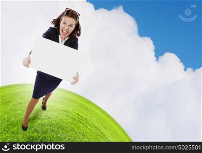 Girl with banner. Top view of excited businesswoman holding white blank banner. Place for text