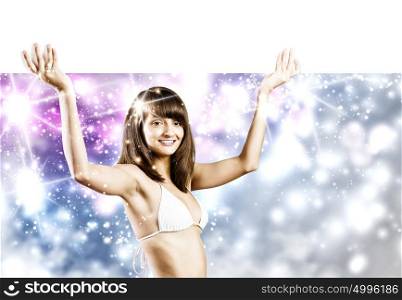 Girl with banner. Young bikini girl holding white blank banner. Place for text