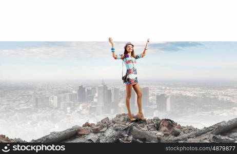 Girl with banner. Young pretty lady in colored dress holding white banner. Place for text