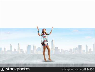 Girl with banner. Young pretty lady in colored dress holding white banner. Place for text
