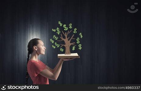Girl with book. Young woman in red dress with book in hands and money tree on pages