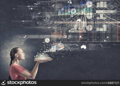 Girl with book. Young woman in red dress with opened book in hand