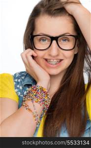 Girl with braces wearing geek glasses teenage fashion isolated