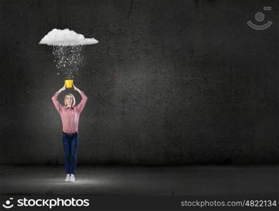 Girl with bucket. Young blond woman with yellow bucket in hands