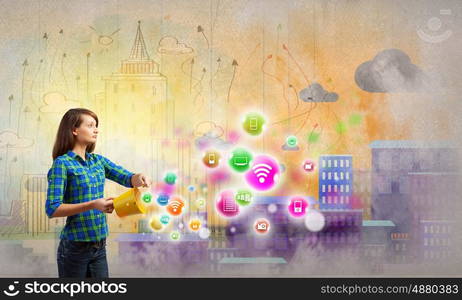 Girl with bucket. Young woman in casual with yellow bucket in hands