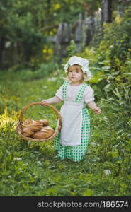 Girl with cakes in a hurry to the grandmother.. Child with a basket of fresh pastries 4666.