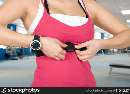 Girl with checking pulse watch closeup