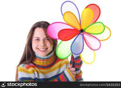 Girl with colorfull pinwheel isolated on white