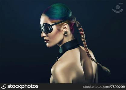 girl with coloured hair and eye-patch